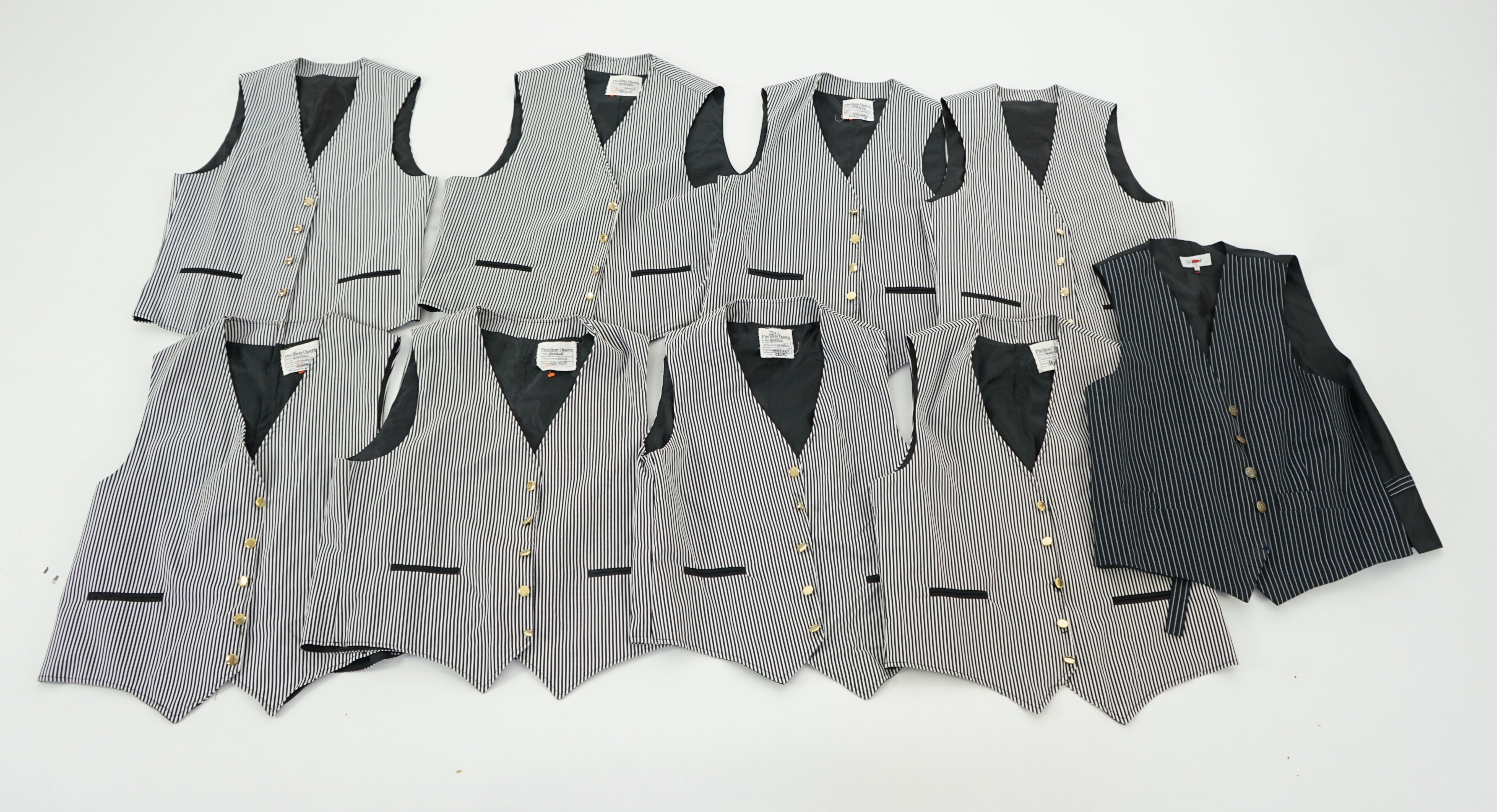 Nine men's black and white striped waistcoats (various sizes) some marked Pavilion Opera 'The Barber of Seville'